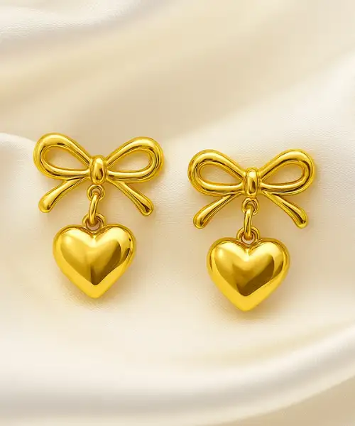 gold bow heart earrings